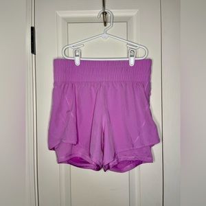Pink workout shorts with built in spandex